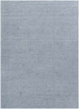 Close-up of the Isako Blue & Gray Solid Washable Area Rug, featuring a subtle textured weave and light gray color. Design-Rectangle-679
