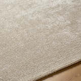 Close up of the ash-colored Pirro Premium Wool Blend Rug showing its ribbed texture and wool blend material. Texture