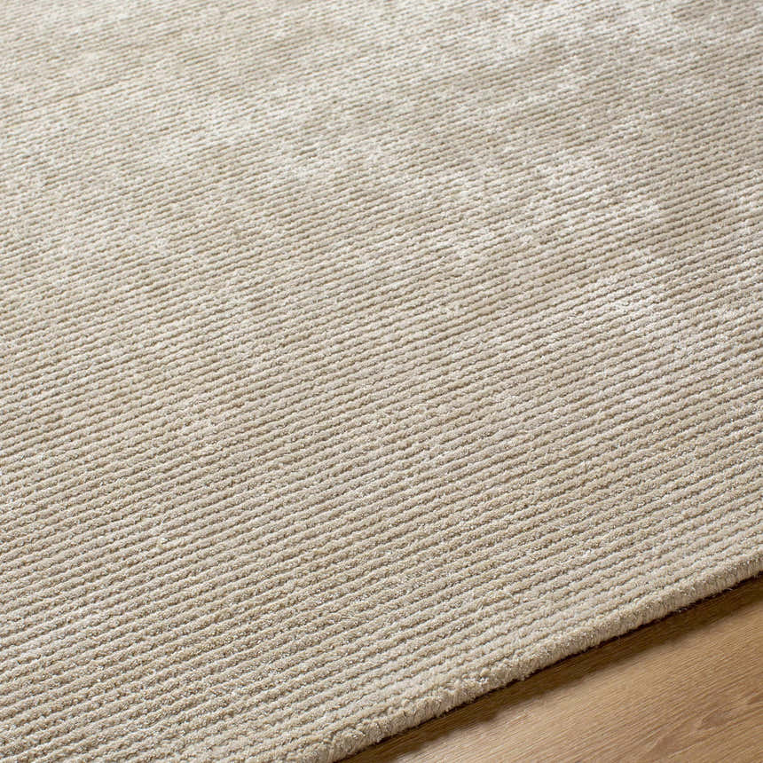 Close up of the ash-colored Pirro Premium Wool Blend Rug showing its ribbed texture and wool blend material. Texture