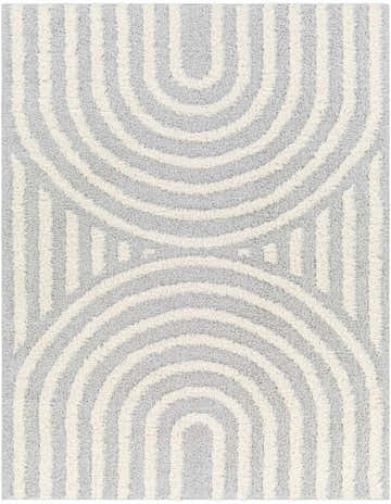 Close-up of the Arnel Gray & Beige Area Rug featuring a geometric pattern of gray and beige shag stripes. Design-Rectangle-537