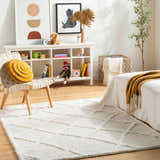 Kids room scene with a white Daube Area Rug, white shelving, and playful decor. Roomscene-Rectangle