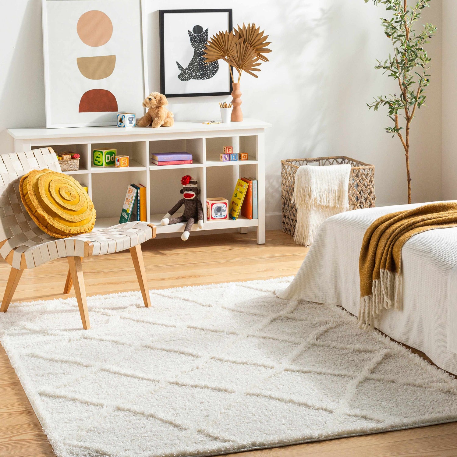 Kids room scene with a white Daube Area Rug, white shelving, and playful decor. Roomscene-Rectangle