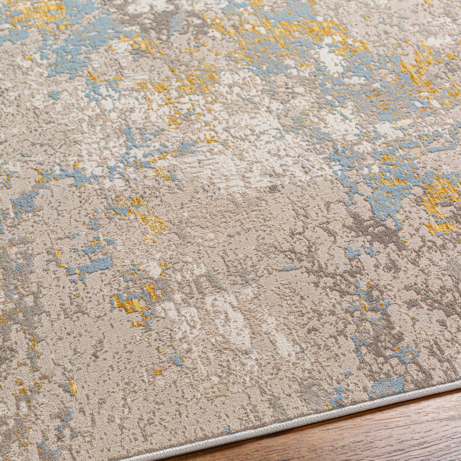 Close up of Bella Area Rug in Beachhouse showing abstract pattern and texture. Texture
