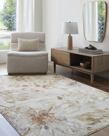 Living room scene with camel and light gray Nasia Area Rug, chair, and mid-century modern console table. Roomscene-Rectangle