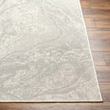 Close-up of Basma Cream Marble Area Rug showing its beige and gray contemporary design and woven texture. Front