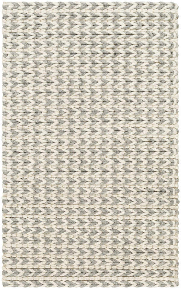 Close-up of a hand-woven Lenci Bone Area Rug. Beige and bone braided wool and cotton create a textured, contemporary design. Design-Rectangle-23