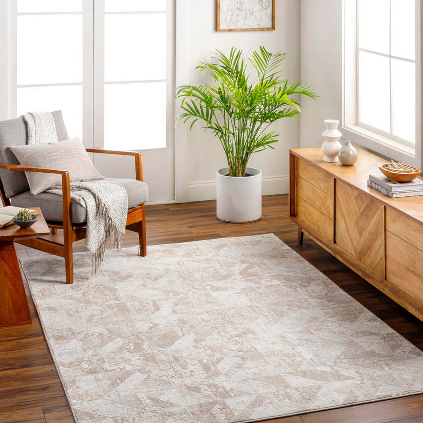 Living room scene with a Gonca Gray Geometric Area Rug, gray chair, and wood accents. Roomscene-Rectangle