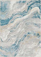 Close-up of the Tess Silver Blue Marble Area Rug, showcasing its swirling silver, blue, and gray marble-like design. Design-Rectangle-537