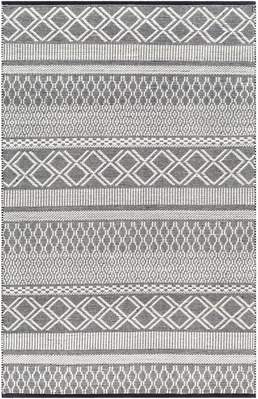 Close-up of the Hala Area Rug. Hand-woven wool rug in dark gray, nickel, off white, and taupe with geometric patterns. Design-Rectangle-576