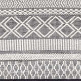 Close-up of the Hala Area Rug. Hand woven wool rug with geometric diamond pattern in dark gray, nickel, off white, smoke and taupe. Swatch