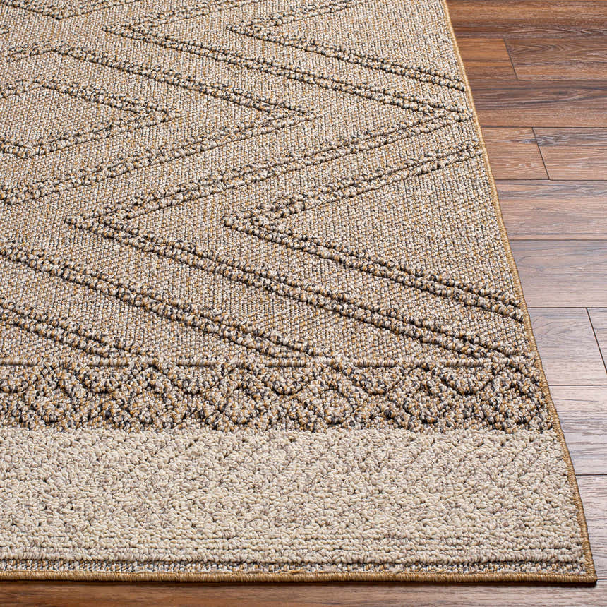 Close-up of the Beige Areli Area Rug showing its geometric pattern, taupe, mustard, and black colors, and textured weave. Front