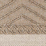 Close-up of Beige Areli Area Rug. Shows texture and geometric pattern in beige, mustard, and black. Swatch