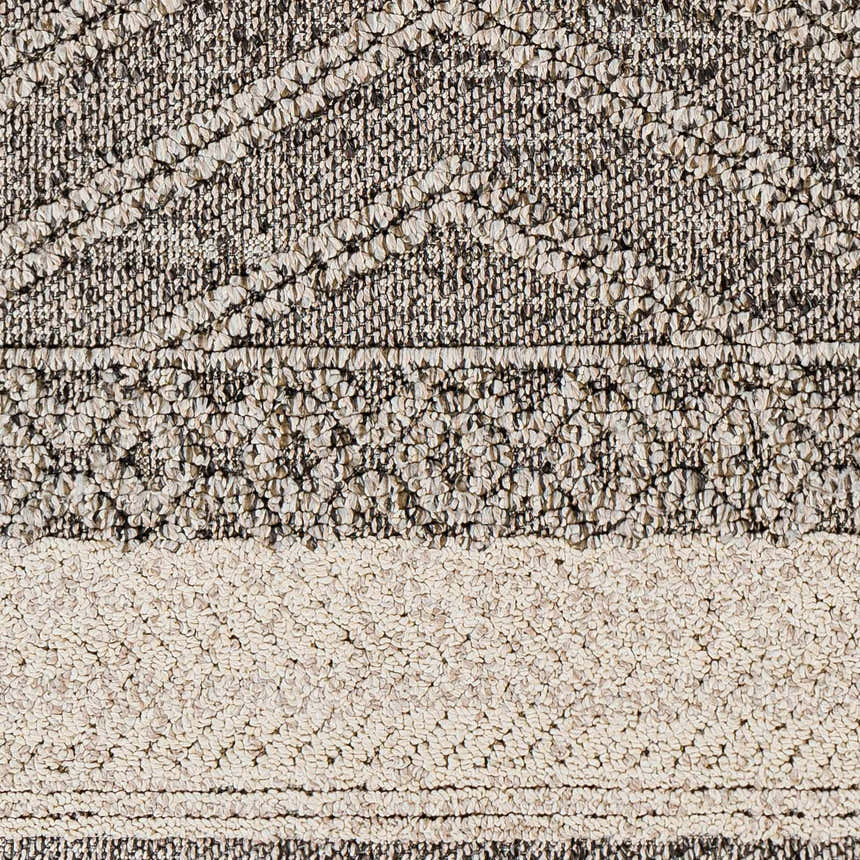 Close-up of the Areli Beige / Brown Outdoor Rug. Contemporary design with geometric patterns and textured weave. Swatch