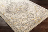 Close up of Stockwell Thick Luxe Rug showing ivory, gold, and gray traditional pattern and plush texture. Corner