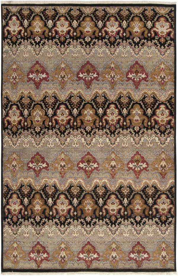 Close-up of the Stoutsville Carpet, a hand-knotted rug with a traditional design in amber, black, red, and gray wool. Design-Rectangle-5686