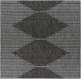 Close-up of the Stephan Area Rug with a black and cream geometric Southwestern-inspired design. Design-Square-67