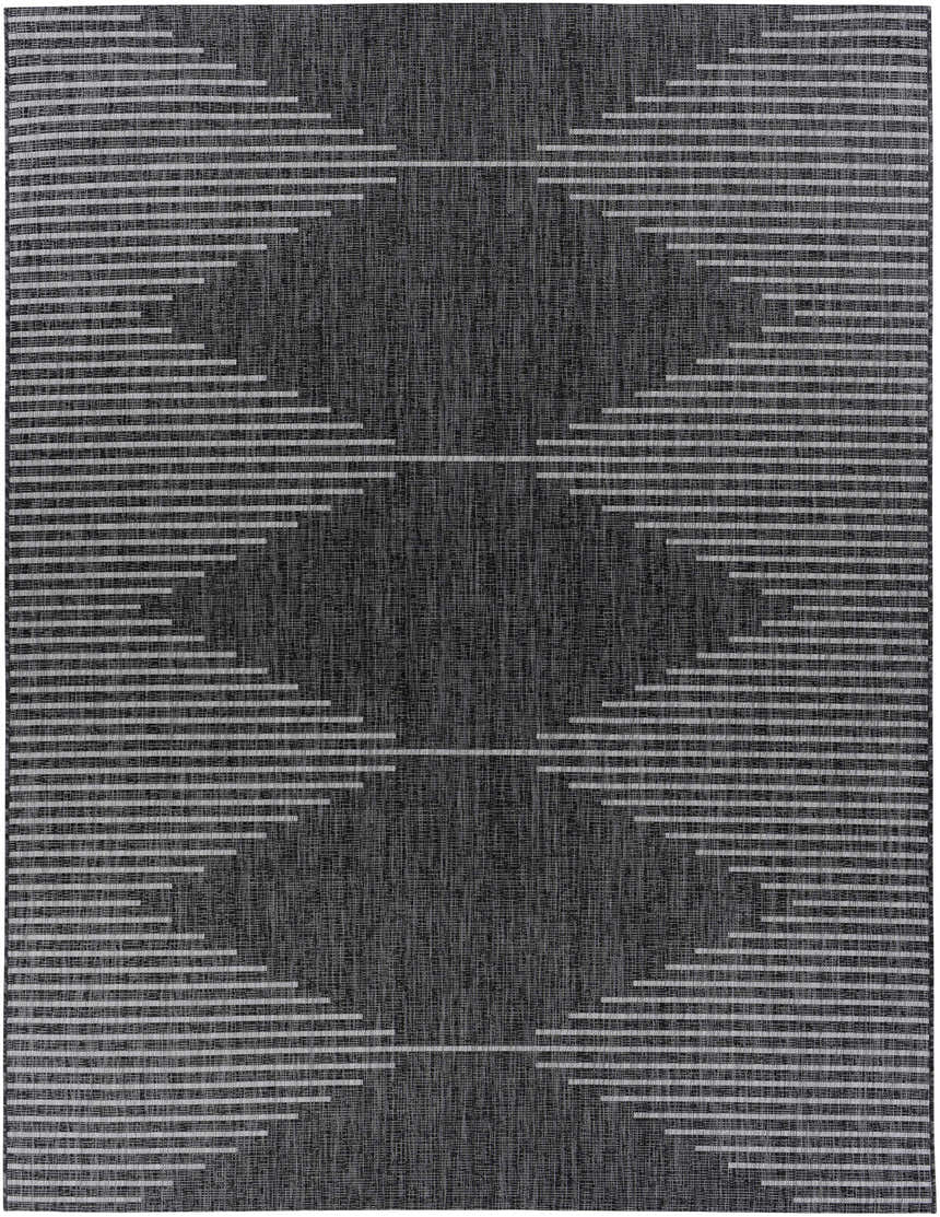 Close-up of the Stephan Area Rug featuring a geometric Southwestern pattern in black, charcoal, cream, and light gray. Design-Rectangle-710102
