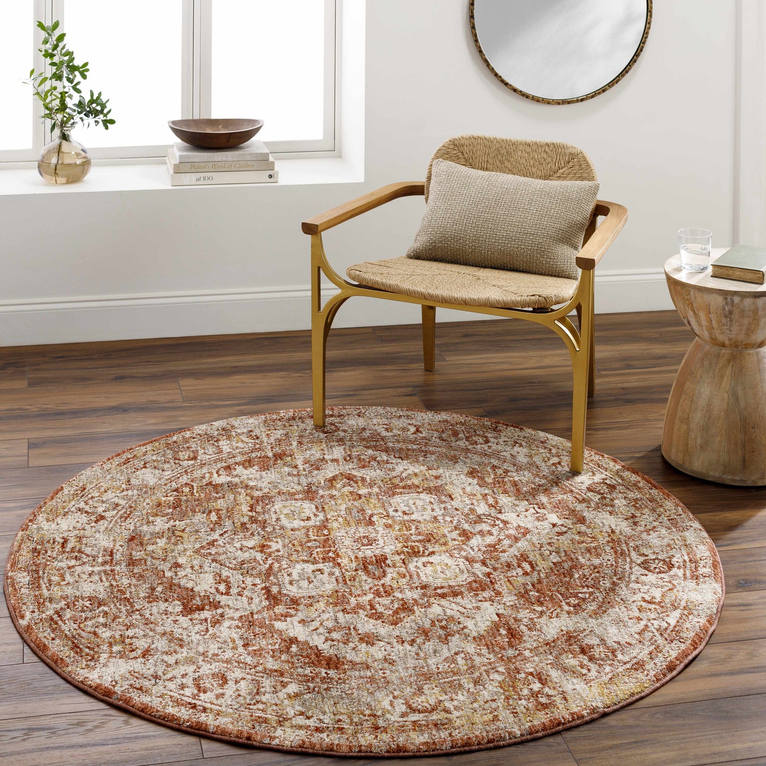 Living room scene with a round Strathbogie Traditional Red Area Rug under a chair and side table. Roomscene-Round