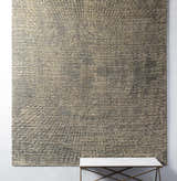 Close-up of the Streatley Area Rug in beige, black, and gray with a contemporary, hand-knotted design. Viscose texture. Styleshot