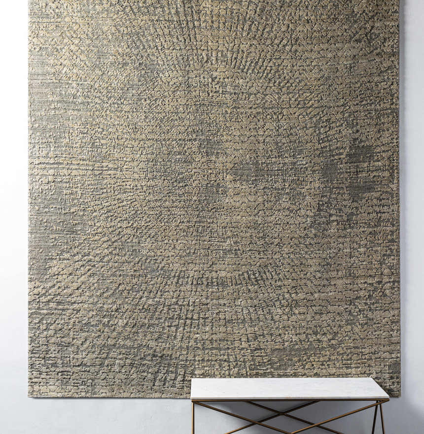 Close-up of the Streatley Area Rug in beige, black, and gray with a contemporary, hand-knotted design. Viscose texture. Styleshot