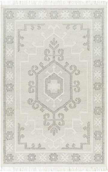 Close-up of the hand woven Afra Area Rug. Farmhouse style rug in cloud gray and dark gray with a traditional geometric pattern. Design-Rectangle-576