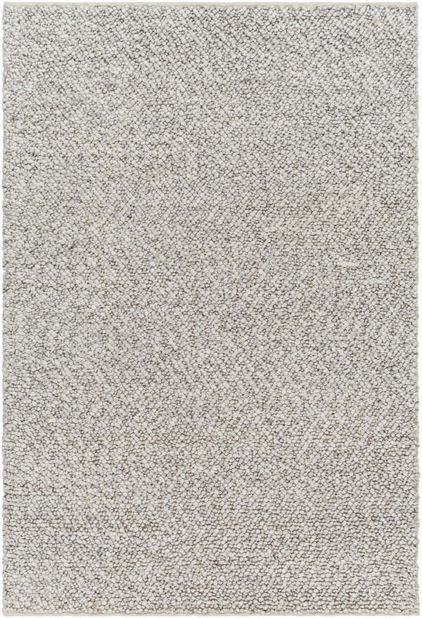 Close-up of the hand woven Chole Area Rug showing texture and neutral gray color variations. Design-Rectangle-576