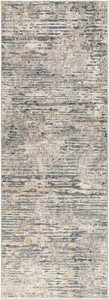 Close-up of the Sywell Luxe Fringe Rug. Contemporary design with beige, blue, charcoal, and tan hues. Machine woven polyester texture. Design-Runner-2773