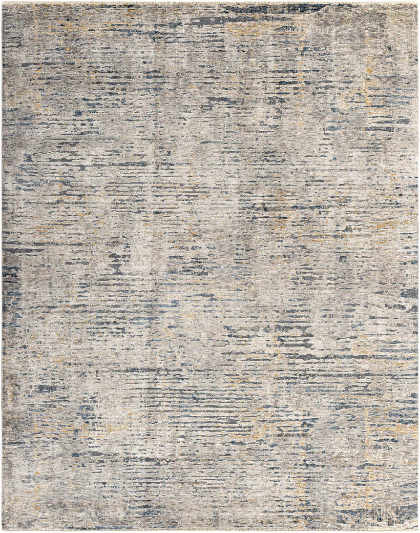 Close-up of the Sywell Luxe Fringe Rug. Beige rug with blue, charcoal, and tan abstract pattern and subtle fringe. Design-Rectangle-710103