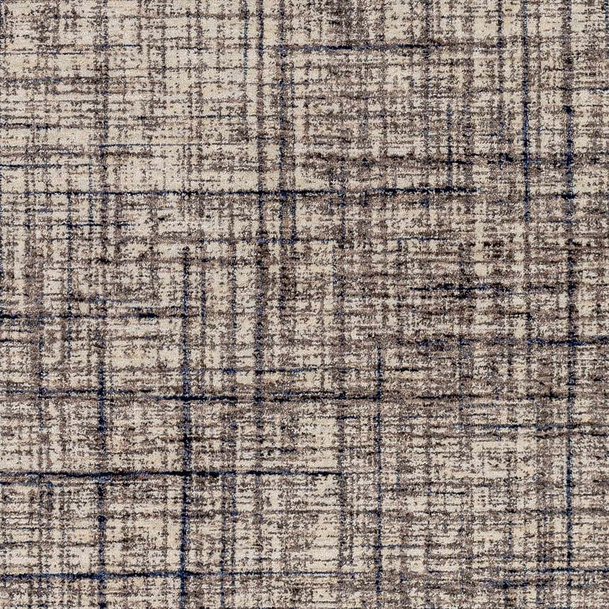 Close-up of Taysan Area Rug showing a mocha and taupe grid pattern with dark gray and eggplant accents. Swatch