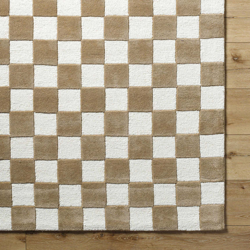 Close-up of the hand-tufted Timin Brown Checkered Wool Area Carpet. Cream and brown squares create a contemporary pattern. Corner