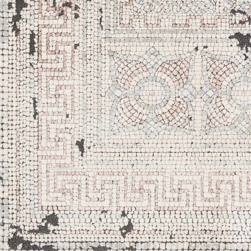 Close-up of the Terlingua Area Rug, featuring a beige, black, and pastel red geometric pattern. Bohemian style. Swatch