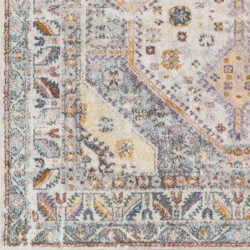 Close-up of the Thornley Area Rug showing its traditional, Southwestern pattern in blue, orange, pink, and yellow tones. Swatch