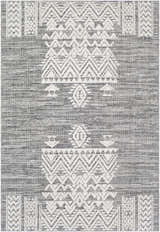 Close-up of the Thorntonville Outdoor Rug; gray jute and white polypropylene with a bohemian geometric pattern. Design-Rectangle-5373