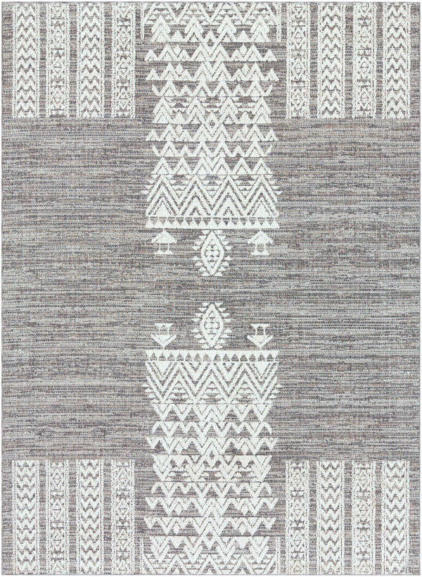Close-up of the Thorntonville Outdoor Rug. Bohemian style rug with a gray background and white geometric pattern. Design-Rectangle-710103
