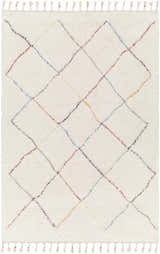 Close-up of Tigao Area Rug: Cream shag rug with diamond pattern in black, orange, pink, navy, and olive. Tassels on both ends. Design-Rectangle-537
