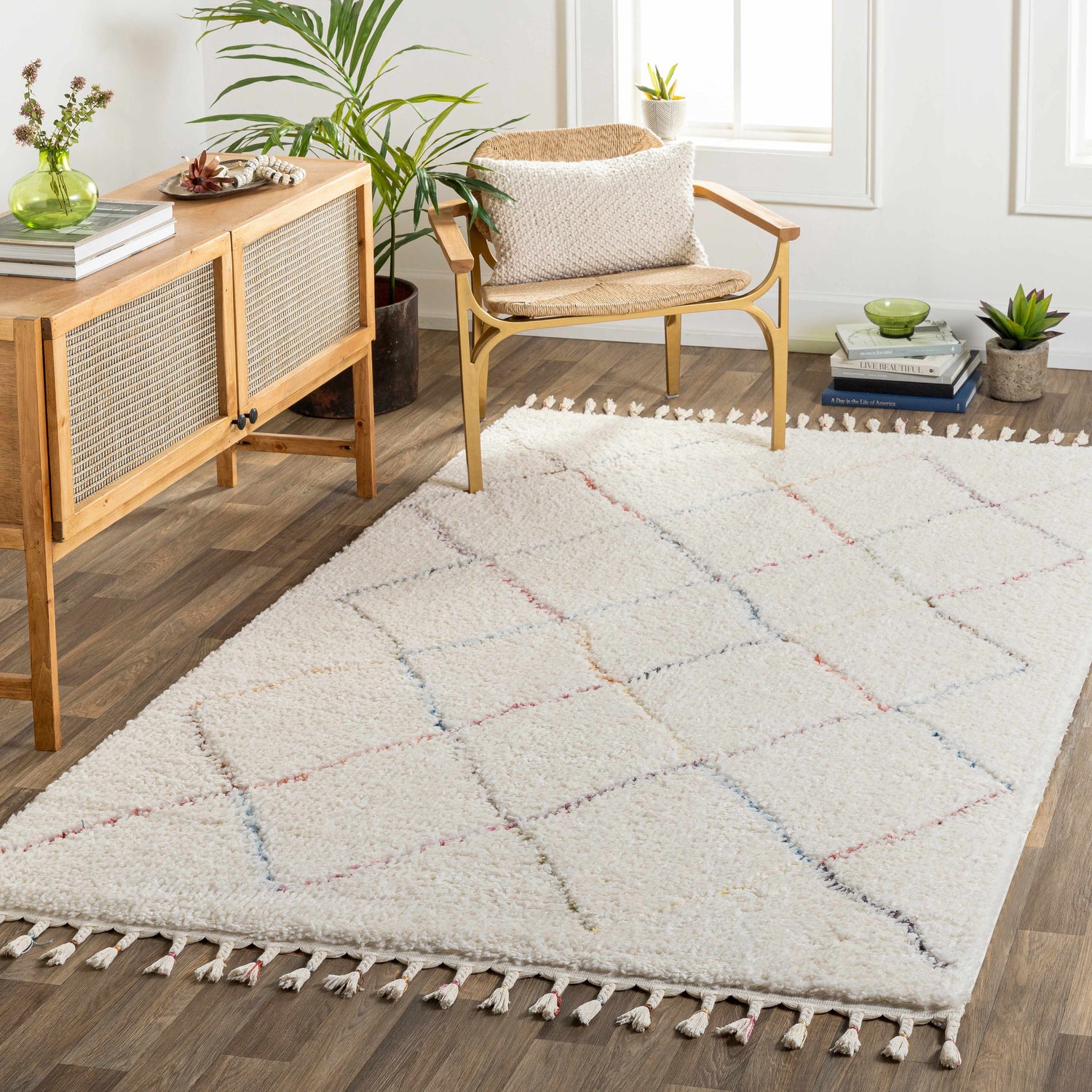 Living room scene with a farmhouse style Tigao Area Rug, wood floors, and a natural wood accent cabinet. Roomscene-Rectangle