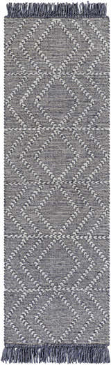 Close-up of the hand-woven Tidman Area Rug. Charcoal gray with cream geometric stripes and fringed edges. Design-Runner-268