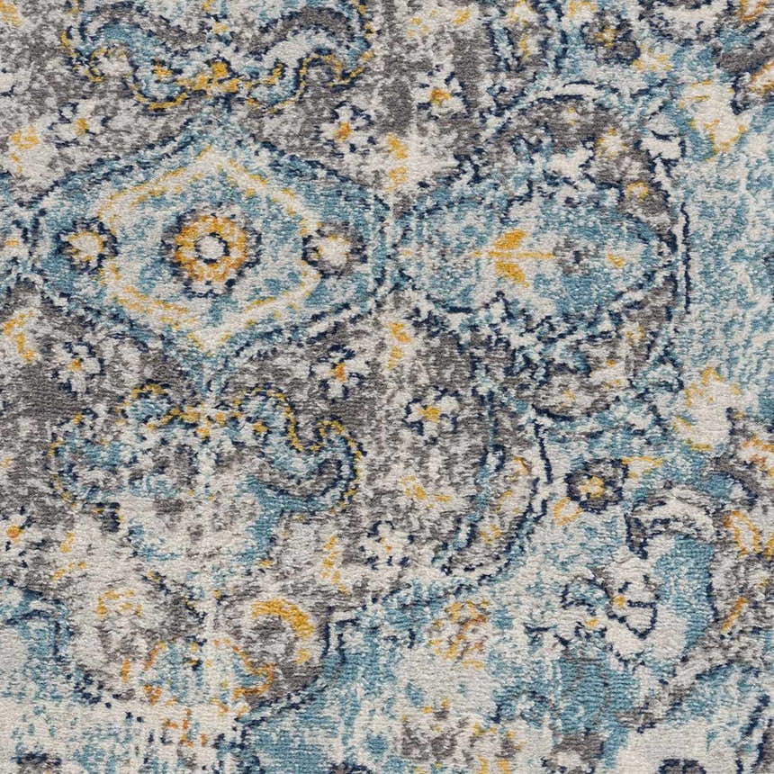 Close-up of the Tigrit Blue 2301 Area Rug. Features a traditional, bohemian pattern in blue, ivory, turquoise, and gold tones. Texture