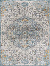 Close-up of the Tigrit Blue 2301 Area Rug, featuring a floral bohemian pattern in blue, ivory, and turquoise tones. Design-Rectangle-286