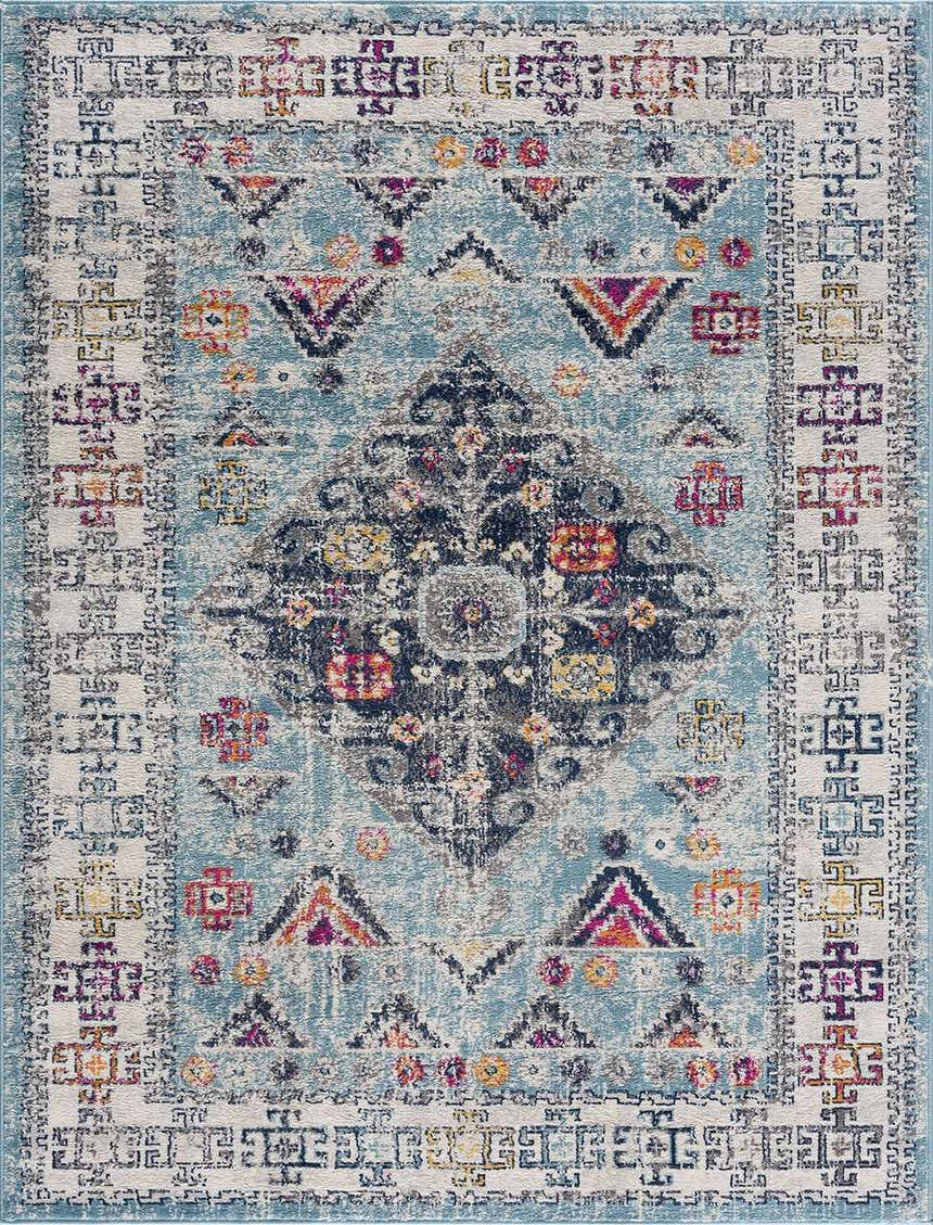 Close-up of the Tigris Turquoise 2314 area rug. Bohemian style with ivory, blue, mustard, and pink tones. Design-Rectangle