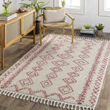 Living room scene with a Tinawagan Area Rug. Farmhouse style with red geometric pattern, tassels, wood floors, and natural light. Roomscene-Rectangle