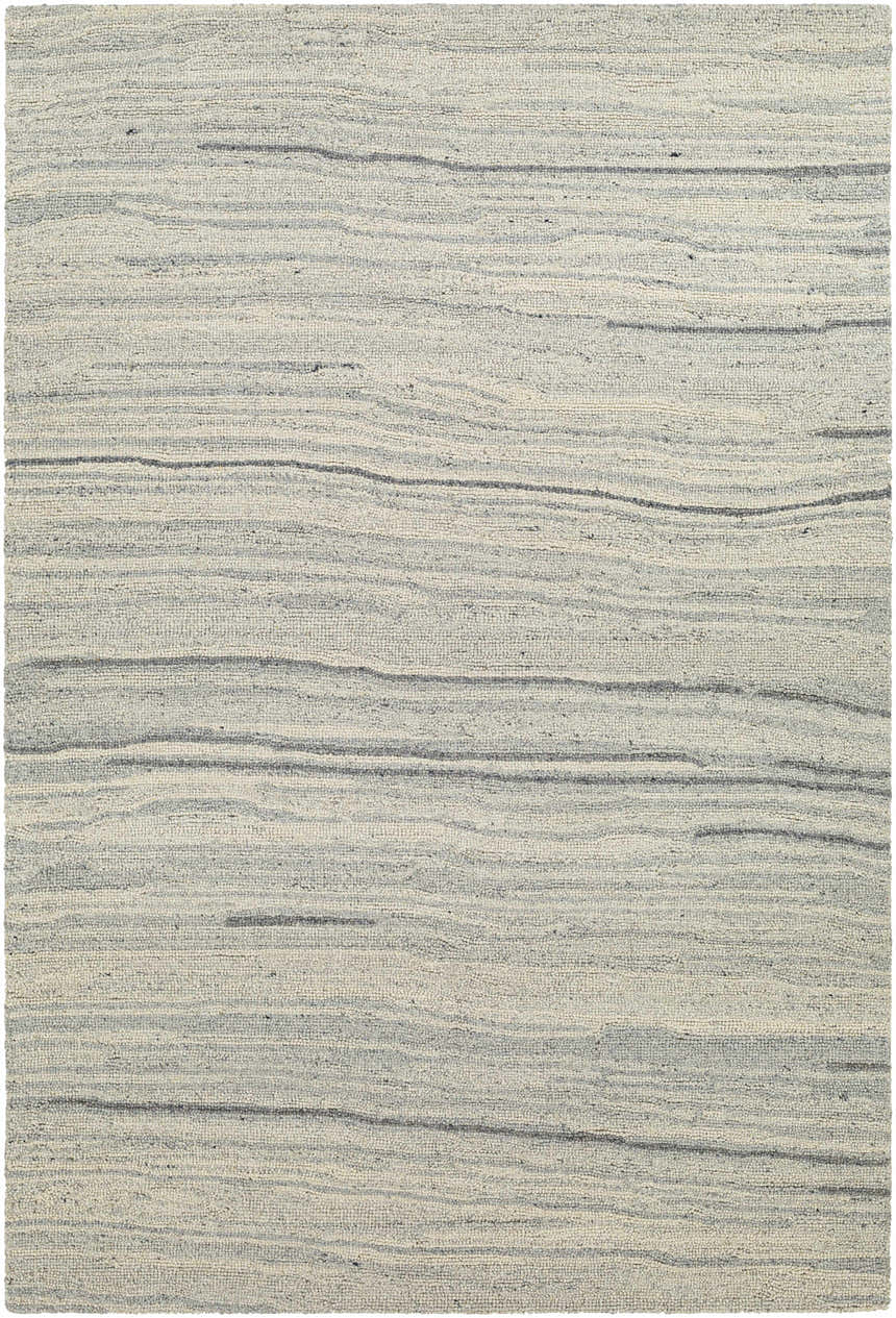 Close-up of the hand-tufted Tinubuan Area Rug. Light beige wool rug with subtle horizontal stripes in light gray and slate. Design-Rectangle-576