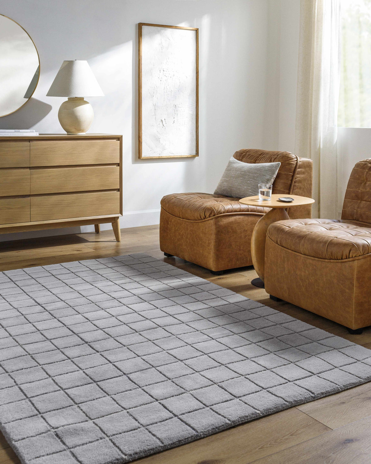 Living room with tan leather chairs and Toshi Sterling Gray area rug. Roomscene-Rectangle