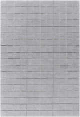 Close-up of the Toshi Sterling Gray Area Rug. Hand-tufted wool rug with a modern grid pattern in shades of gray and silver. Design-Rectangle-576