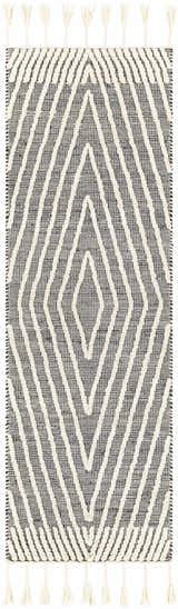 Close-up of a Tamayong Tasseled Jute & Wool Rug. Black rug with cream diamond pattern and tassels. Bohemian style. Design-Runner-268