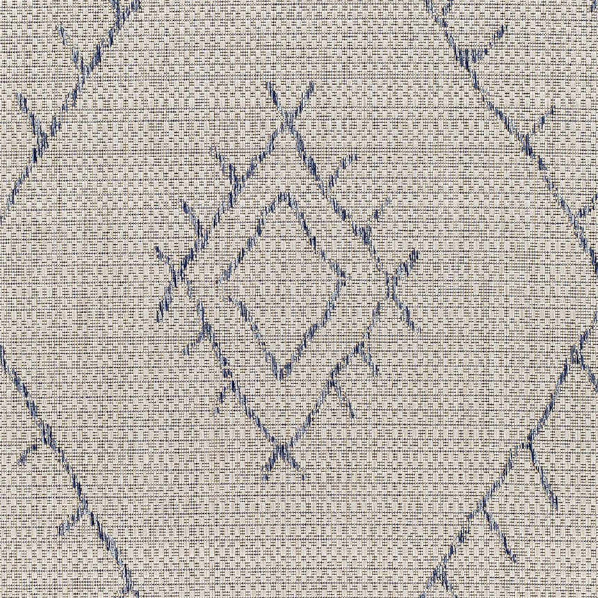Close-up of Marwood Gray&Blue Nordic Rug showing geometric diamond pattern and woven texture. Bohemian style. Swatch