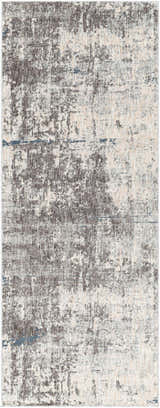 Close-up of the Tonalea Carved Statement Area Rug, showcasing its abstract pattern in gray, ivory, and subtle blue tones. Design-Runner-338