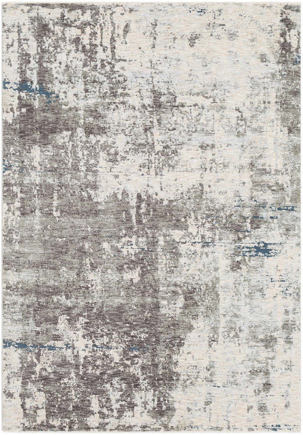 Close-up of the Tonalea Carved Statement Area Rug. Abstract pattern in shades of gray, ivory, and blue. Machine woven texture. Design-Rectangle-582