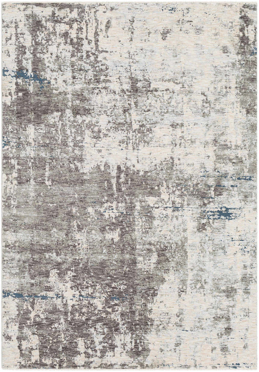 Close-up of the Tonalea Carved Statement Area Rug. Abstract pattern in shades of gray, ivory, and blue. Machine woven texture. Design-Rectangle-582