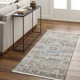 Living room scene with a Baychester Brown runner rug, sofa, and console table on wood floors. Roomscene-Runner
